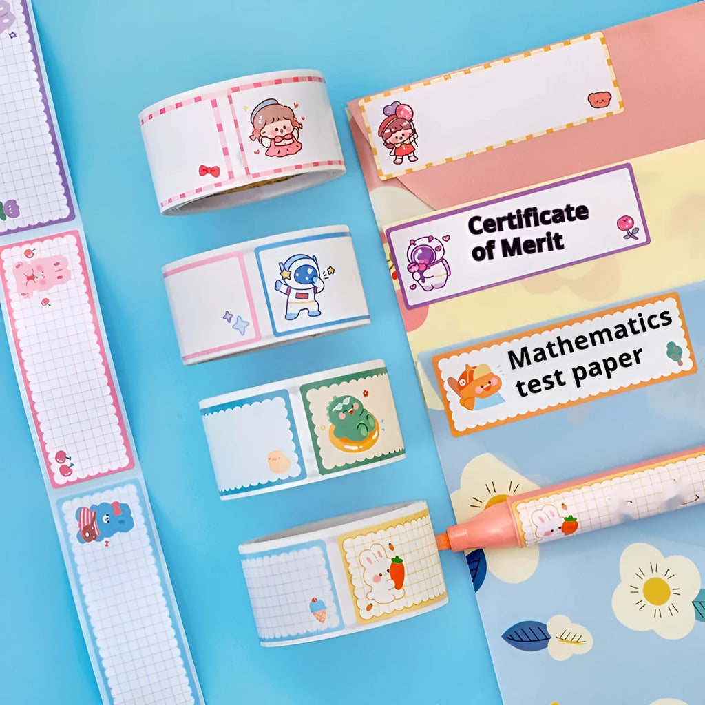 Roll of colourful cartoon name tape stickers showing dinosaur, astronaut, rabbit, and girl designs.