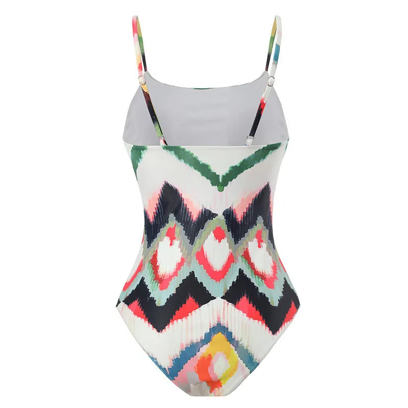 Women's two-piece polyester swimsuit set with matching hip skirt in striped gradient pattern