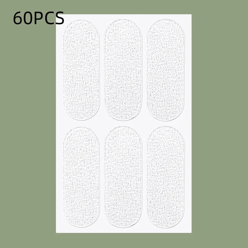 Transparent disposable ear patches on backing paper showing 0.1cm thickness and frosted/clear colour options