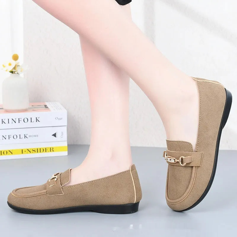 Gommino women's casual slip-on shoes in black with soft rubber sole and round toe