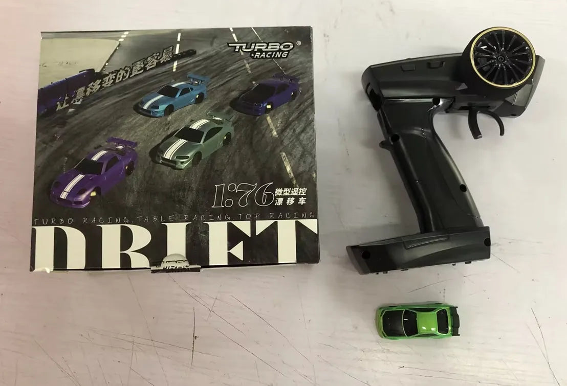 Turbo Racing C64 1:76 scale blue remote control drift car with handle transmitter