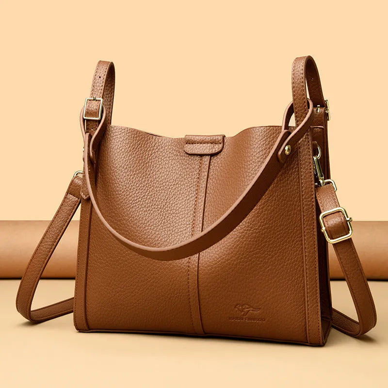 Vertical square ladies shoulder bag in soft PU with internal organisation compartments