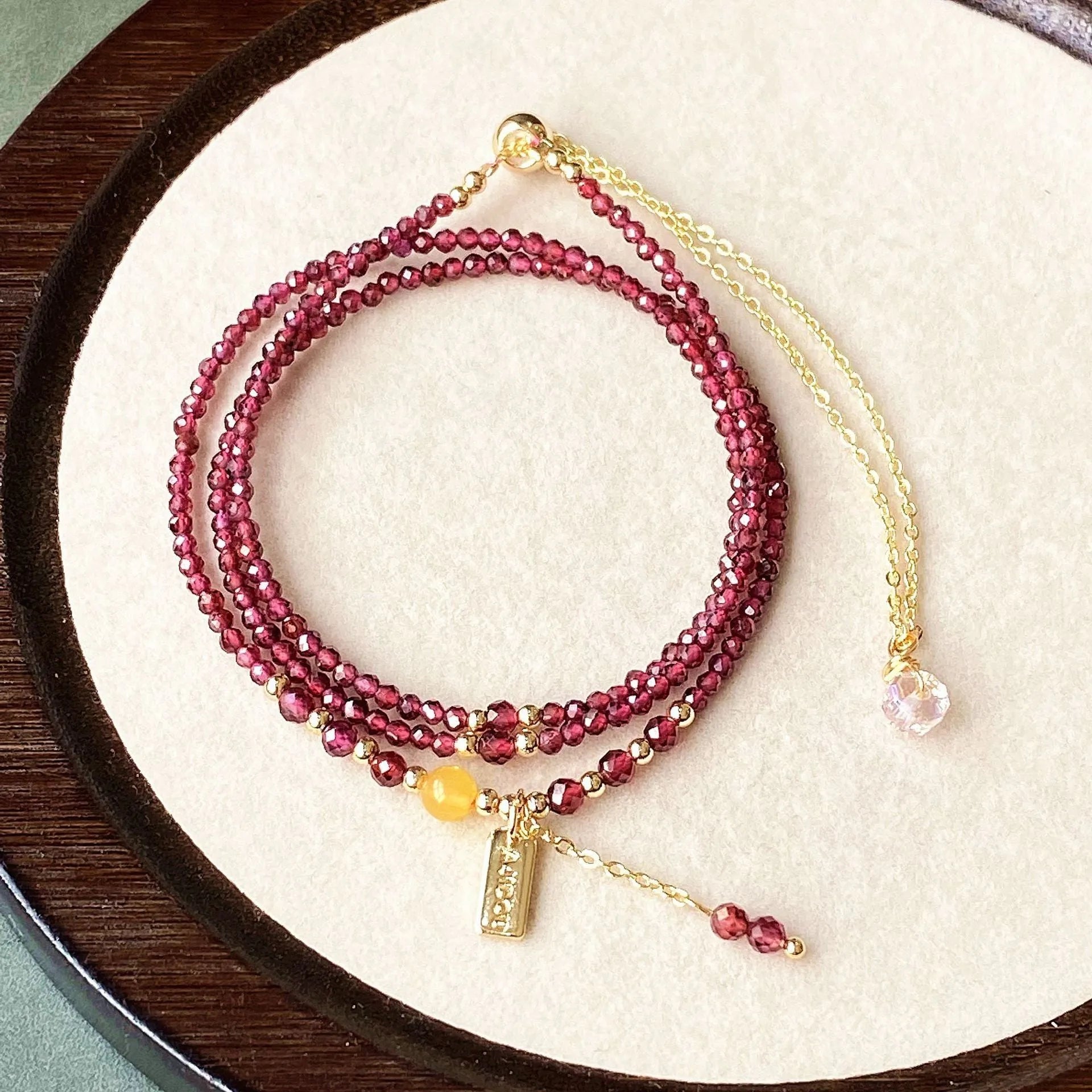 Wine red garnet bracelet necklace with three-circle design and beeswax cut surface texture