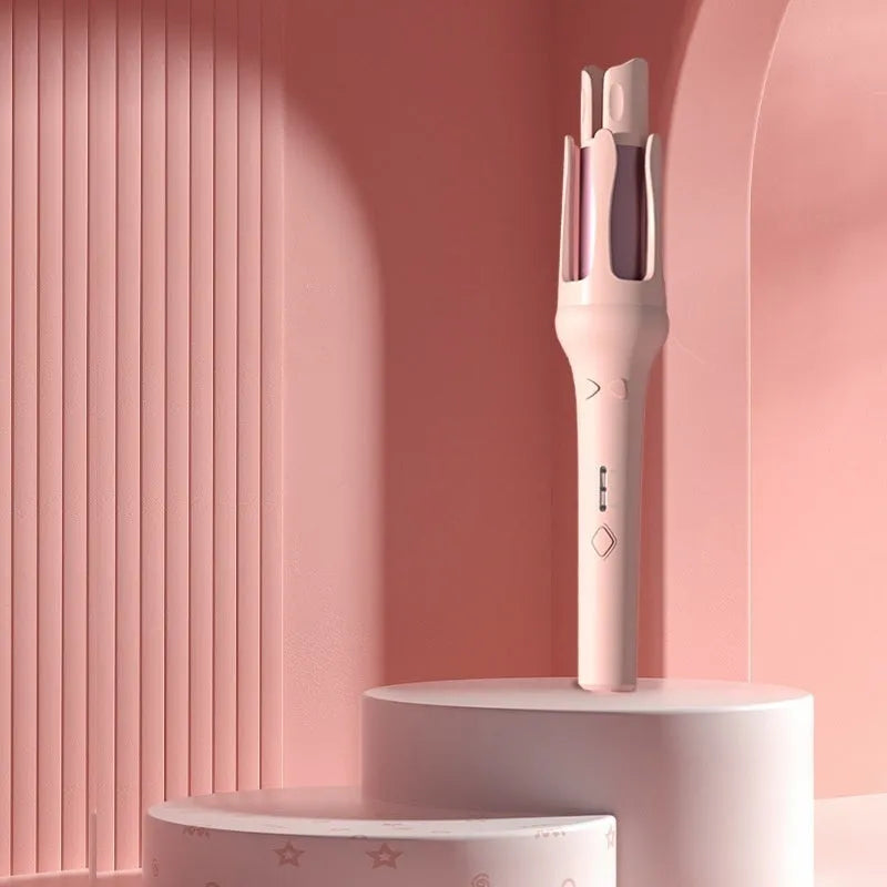 White and pink automatic hair curler with a rotating 32mm ceramic barrel and international plug adapters.