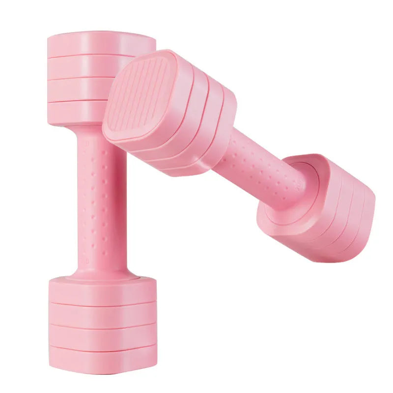 A set of pink detachable plastic dumbbells for women's fitness on a grey background.