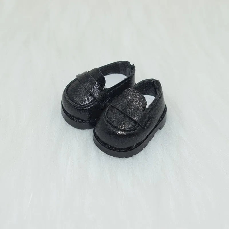 A pair of polyurethane doll shoe accessories for a 17cm figure, shown in a selected style and colour.