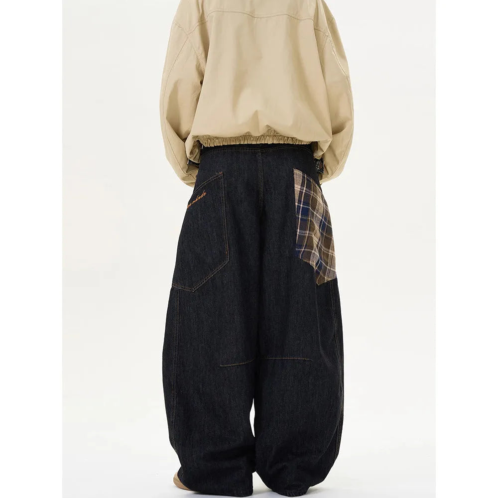 Loose fit straight-leg cotton trousers in a red plaid pattern, shown on a mid-waist.