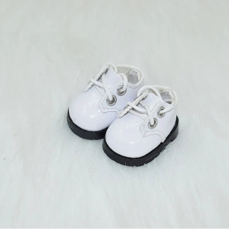 A pair of polyurethane doll shoe accessories for a 17cm figure, shown in a selected style and colour.