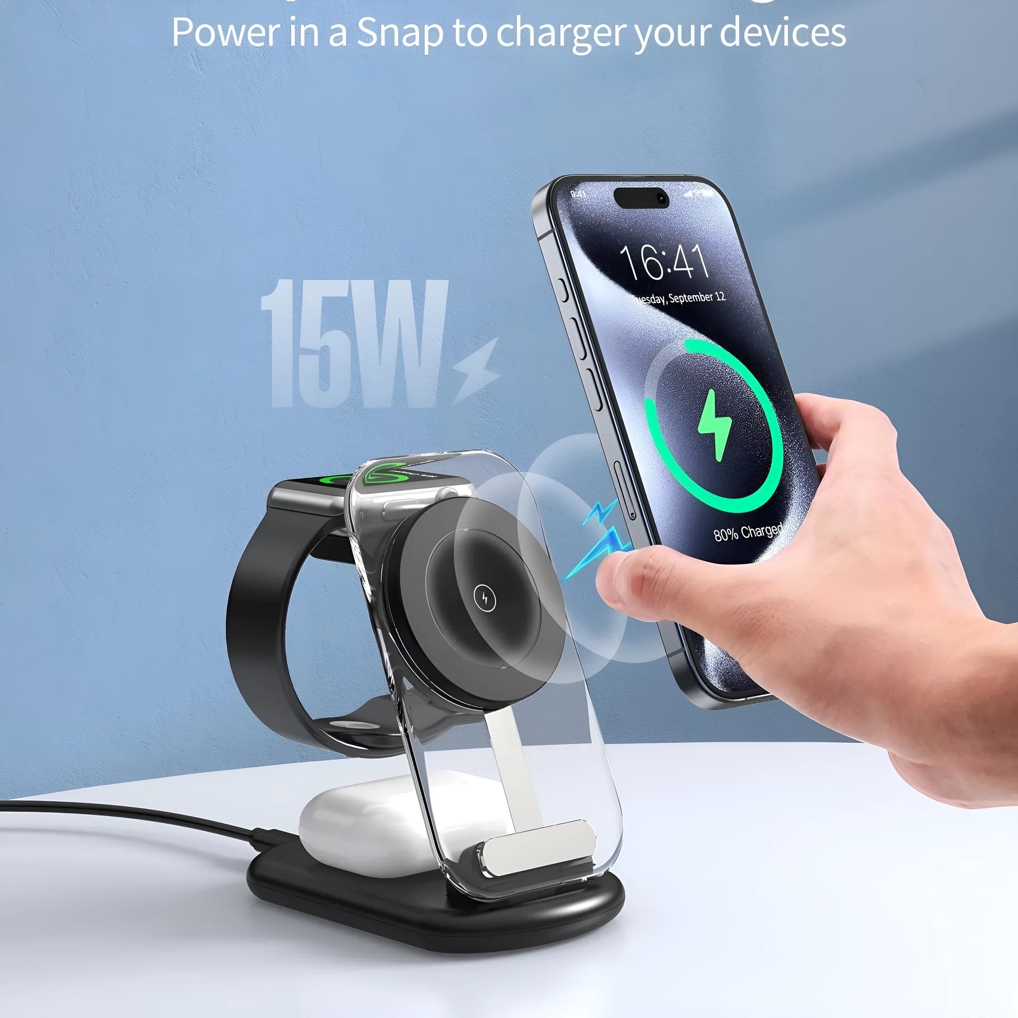 Transparent folding magnetic three-in-one wireless charger showing internal coil, in black, on a desk.