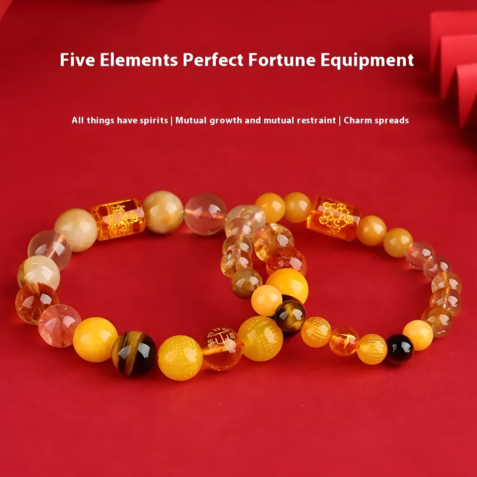 Handmade geometric crystal bracelet in gold, wood, water, fire, or soil colours on a wrist.