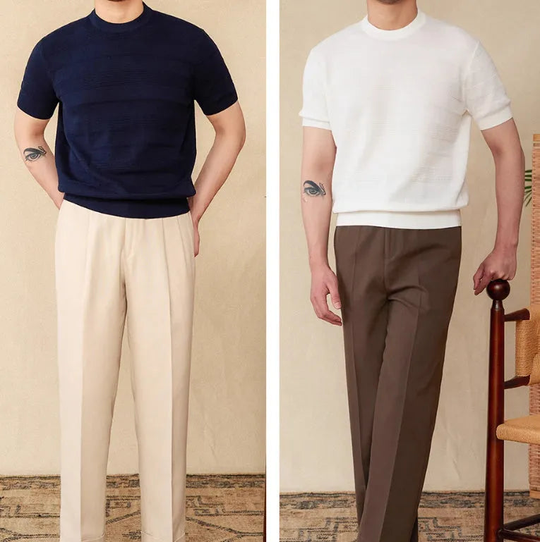 Men's off-white pure cotton short sleeve t-shirt with a round neck, laid flat on a surface.