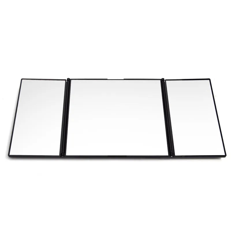 Silver folding makeup mirror shown both closed and opened, next to a car sun visor.