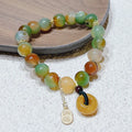 Yellow Lutong agate bracelet with peacock agate and topaz elements, peace buckle clasp, 1cm width women's jewellery