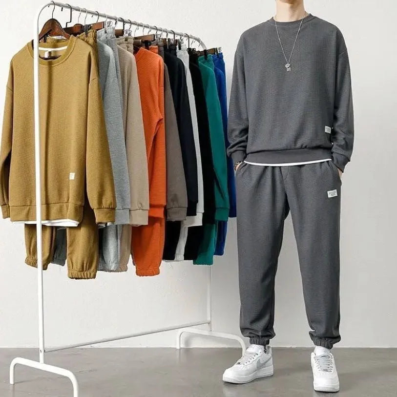 Long-sleeved waffle tracksuit set in nine colours, sizes L to 5XL, chemical fibre blend.