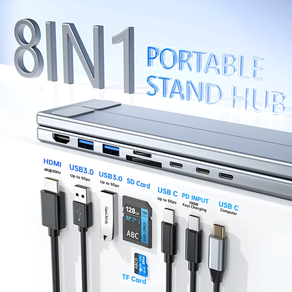 Silver aluminium foldable laptop stand with integrated multi-port docking station and a short connection cable.