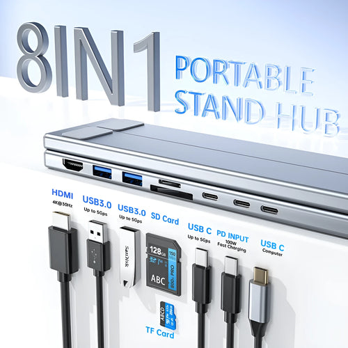 Silver aluminium foldable laptop stand with integrated multi-port docking station and a short connection cable.