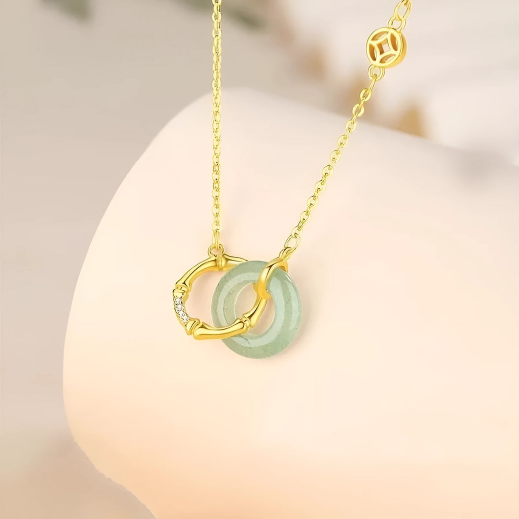 Sterling silver necklace with bamboo peace buckle geometric pendant on adjustable chain