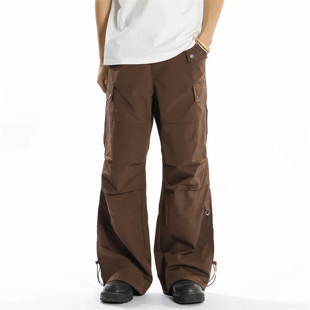 Loose men's cotton trousers in solid colour for street workwear, sizes S to XL, in black and brown