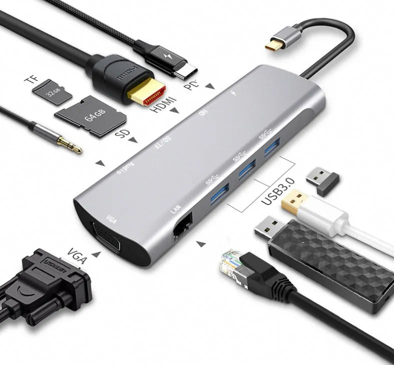 Grey aluminium USB-C docking station with multiple ports including HDMI, VGA, and USB, showing its 140mm attached cable.