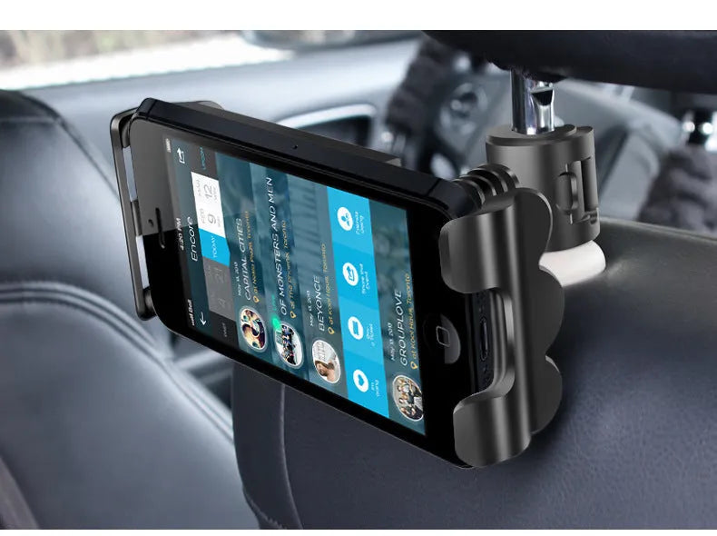 Black universal car headrest tablet holder mounted on a car seat, showing adjustable arm and 360-degree rotation.