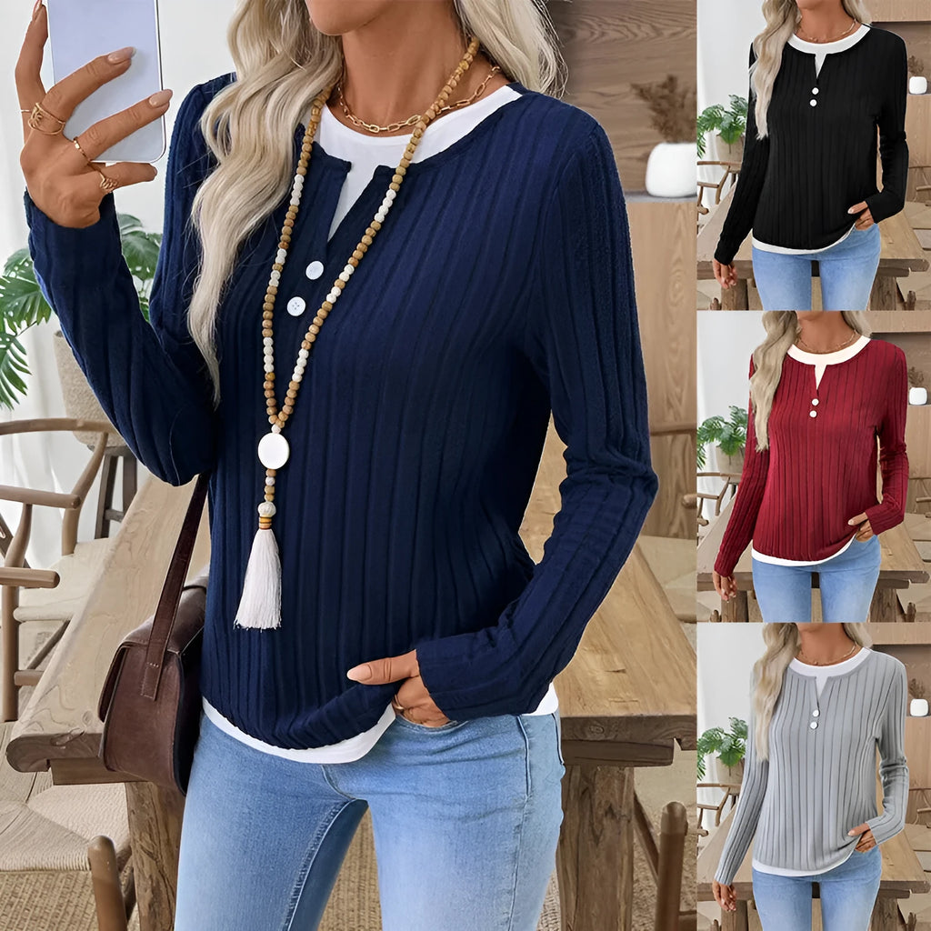 Women's black concave stripe fake two-piece pullover sweater with long sleeves and round neck.