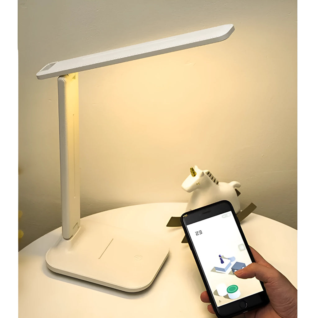 White touch dimming eye protection bedside lamp with USB charging port.