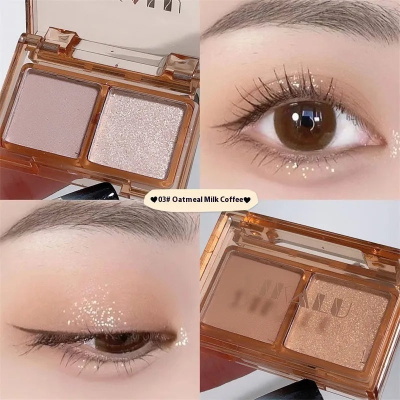 Cool two-tone eye shadow plate showing pink and black matte shimmer colours in a standard cosmetic compact.