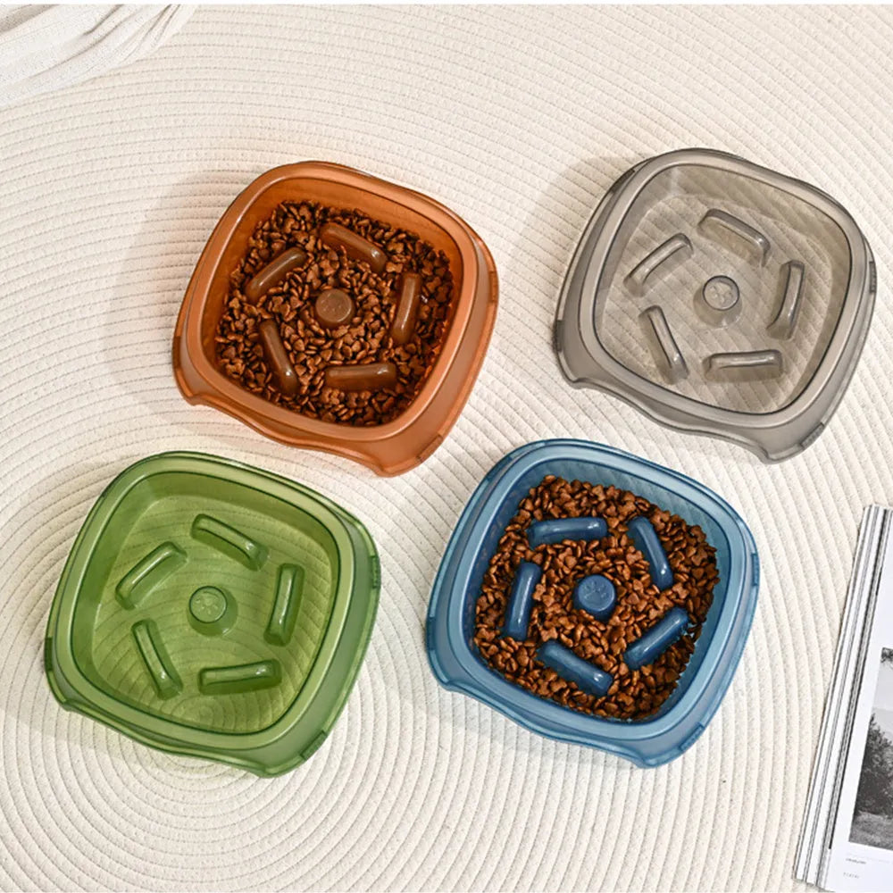 Blue plastic dog slow feeder anti-choking bowl on a white background.