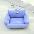 Cartoon big eye pet bed cushion for small dogs and cats in blue, shown with removable sticky eyes.