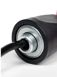 Adjustable jump rope with weighted black handles on a gym mat
