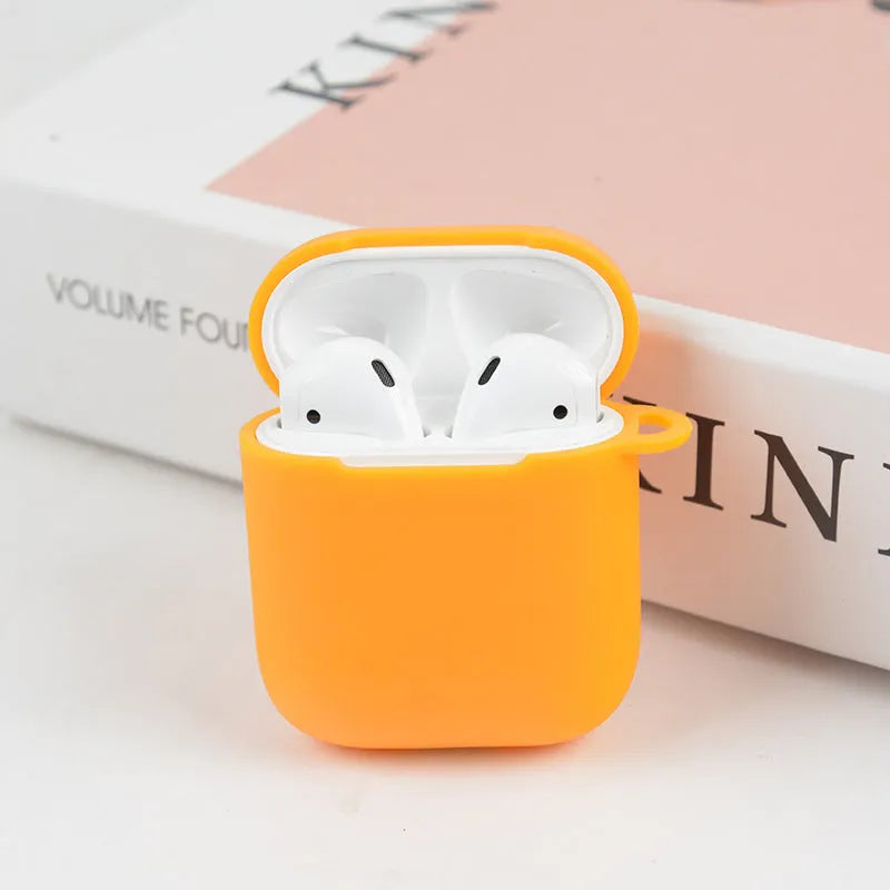 Soft silicone protective case for Bluetooth headphones in various colours on a grey background.