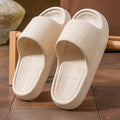 Women's non-slip EVA flip flop slippers in five colours, showing toe ring design and textured sole.