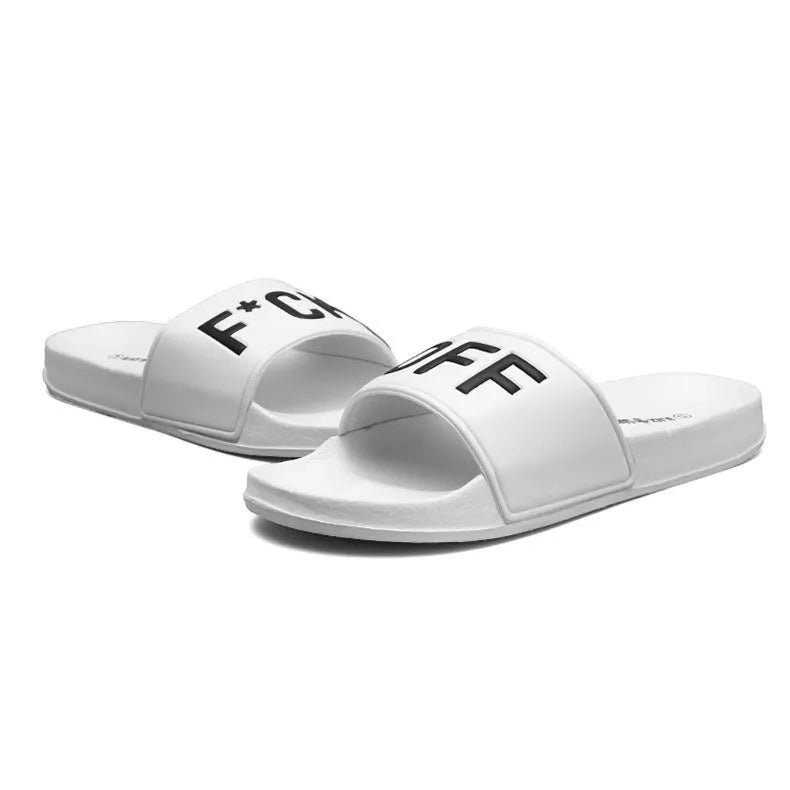 Black and white open-toe men's slippers with a rubber sole, shown on a size chart from 36 to 46.