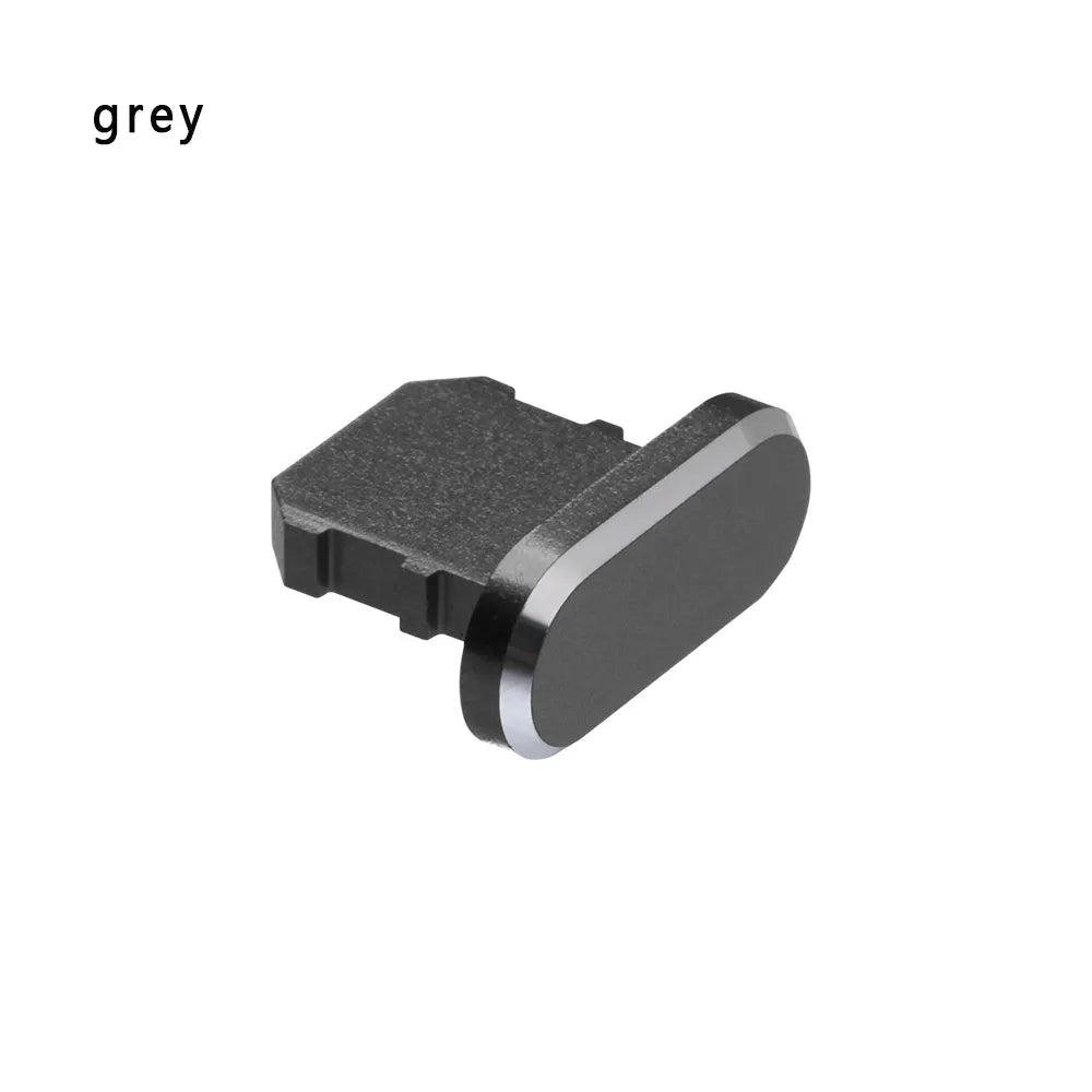 Aluminium alloy charging port dust plug for iPhone in various metallic colours including gold and rose gold.