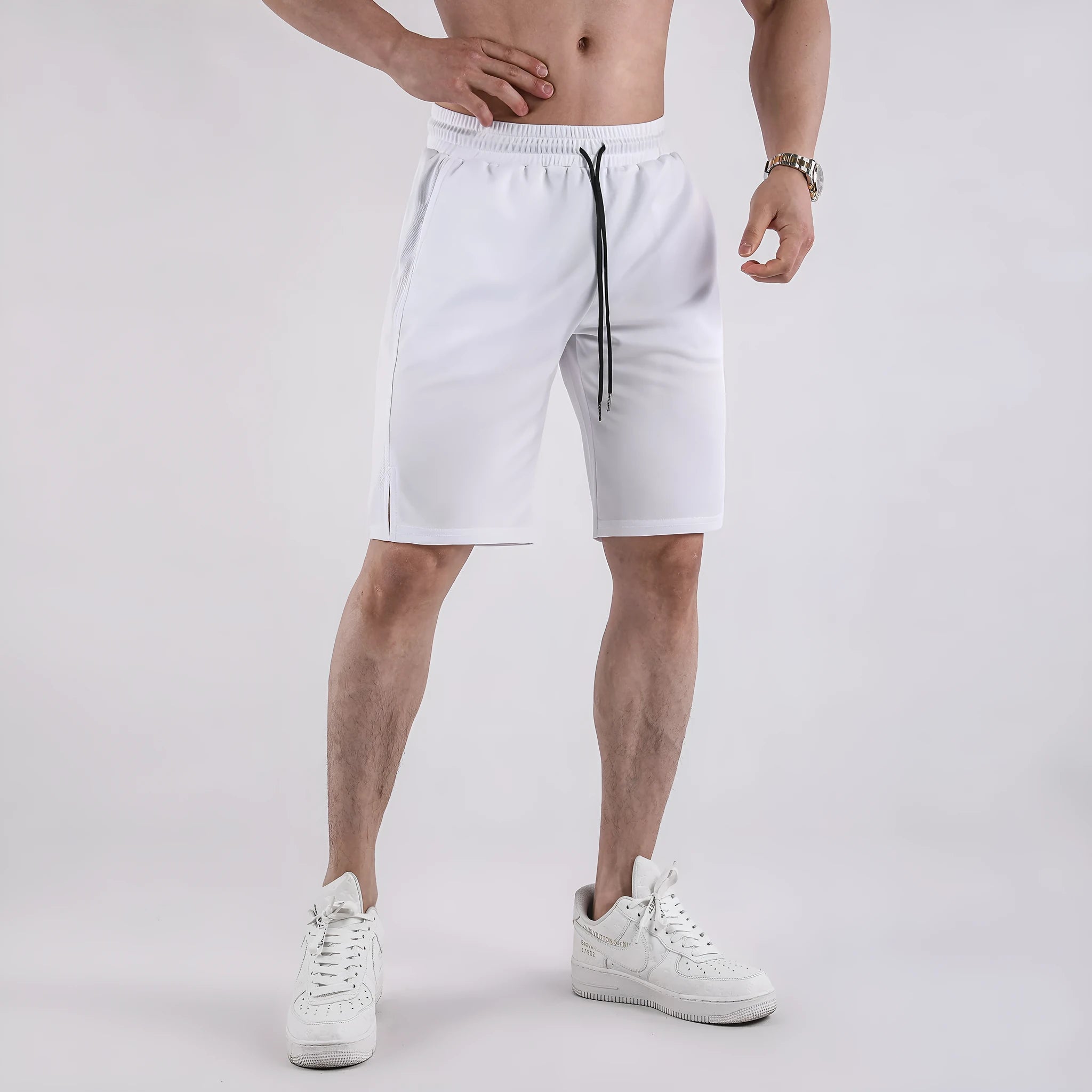 Men's black loose-fit quick-drying mesh casual shorts on a white background.