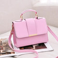 Fashion woman handbag in soft PU with shoulder strap, side view showing polyester lining