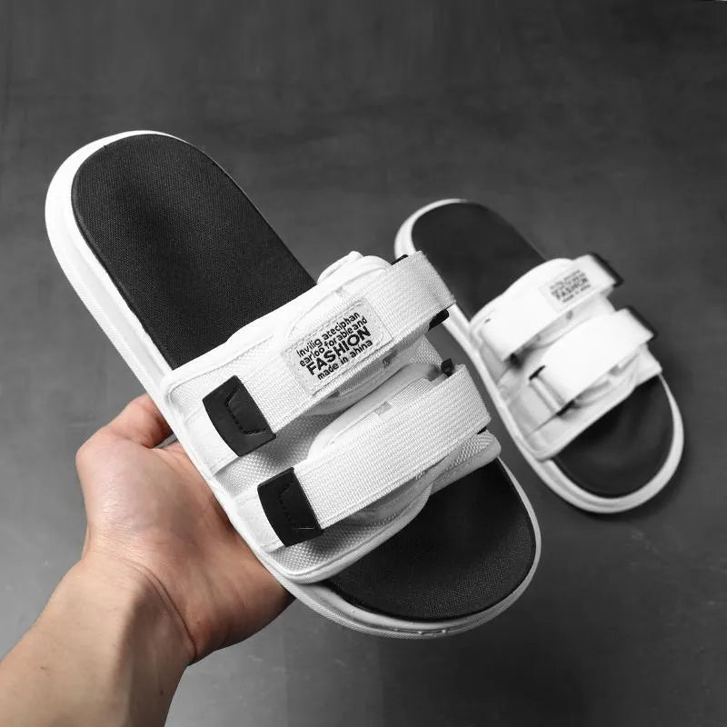 Men's canvas sports sandals with hook-and-loop closure in black and white, available in six sizes from UK 35-36 to 45-46.