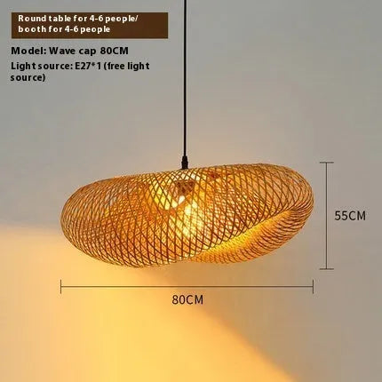 Bamboo hanging lamp with straw hat-shaped rattan weave in natural tones showing light diffusion