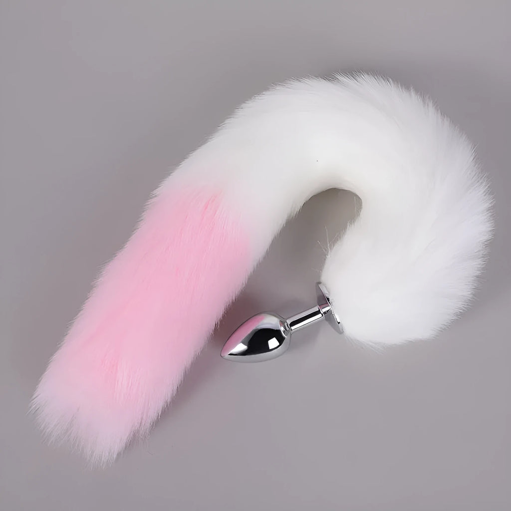 Pink PU leather manual craft adult toy docking plug lying on a light background