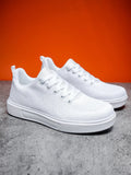 Light white unisex trainers with thick EVA sole and mesh upper in black or white colours
