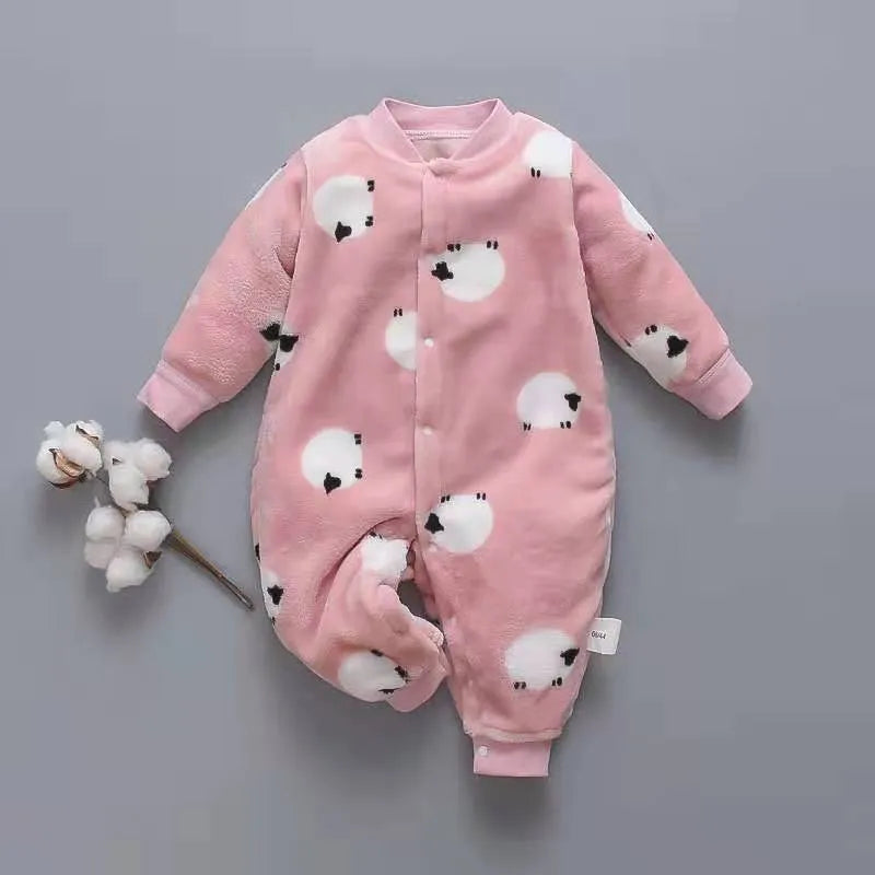 Baby wearing a long sleeve flannel romper with a printed panda pattern in pink and blue.