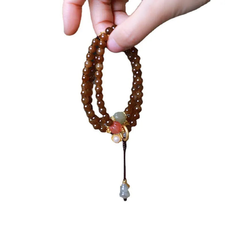 Brown jade Hetian jade three-ring bracelet with silver plated details for 14-16 cm wrists.