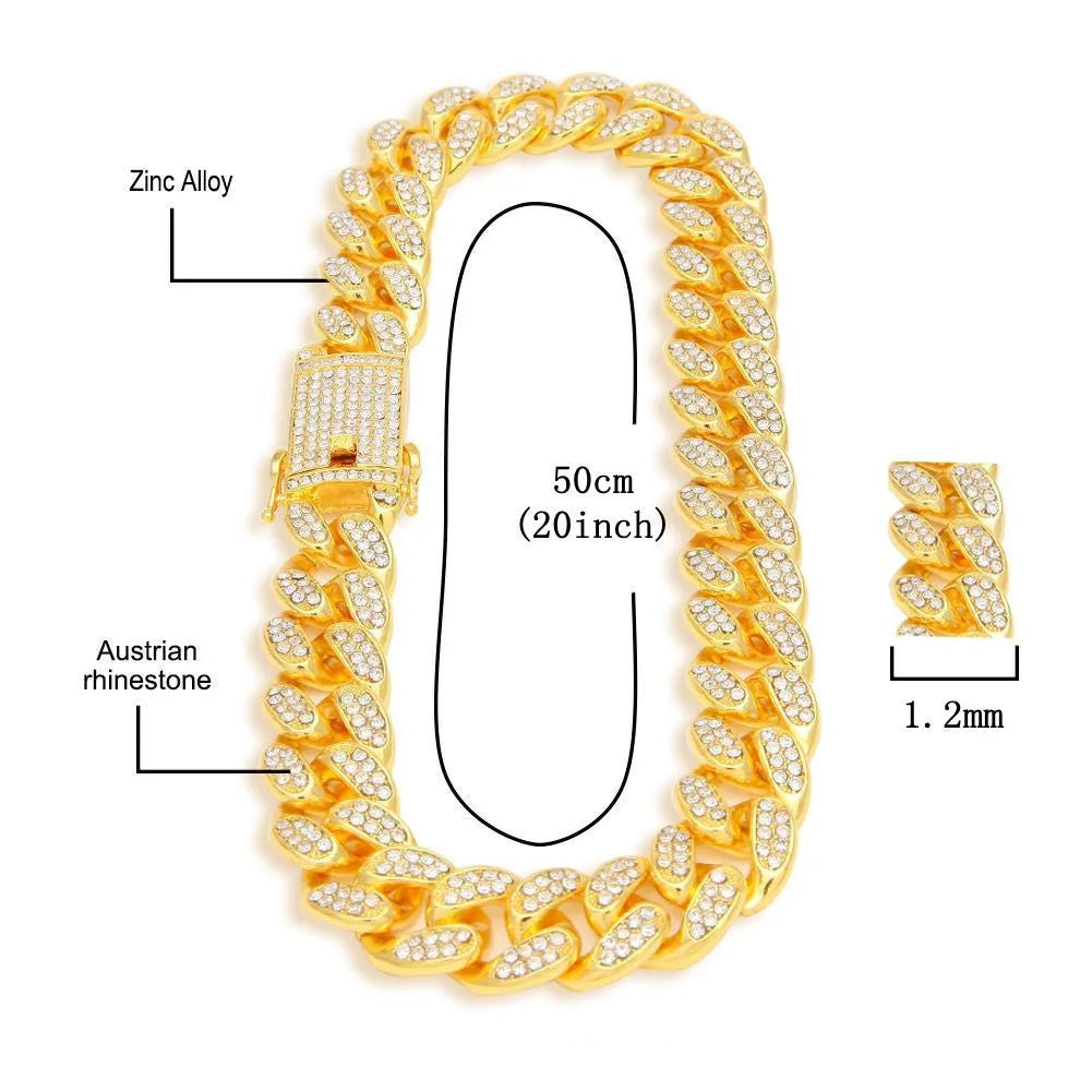 Roman numeral quartz watch with black mesh band, bracelet, and necklace set in gold colour.