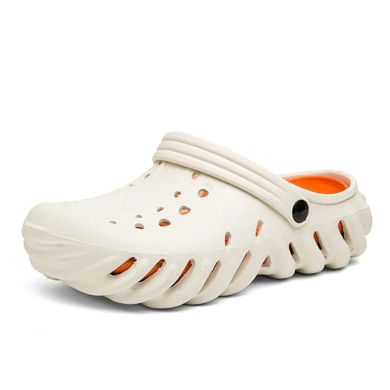 Men's beige ventilated EVA slipper sandals with hollow-out design and round toe on a plain background.