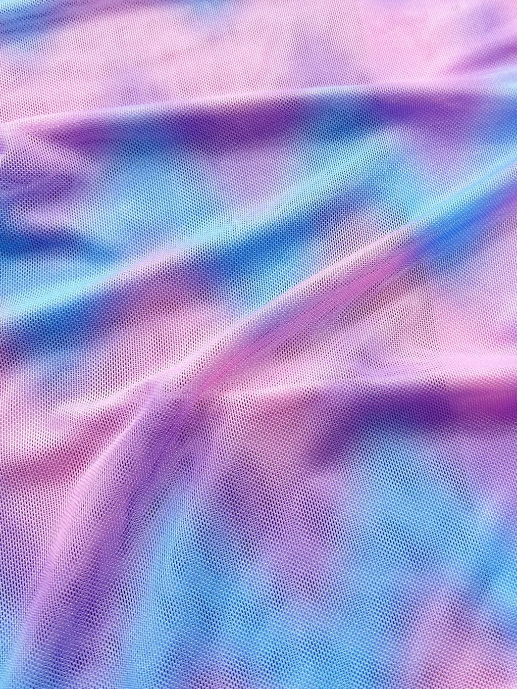 Women's split tie-dye swimsuit bikini set showing bra, skirt and panties