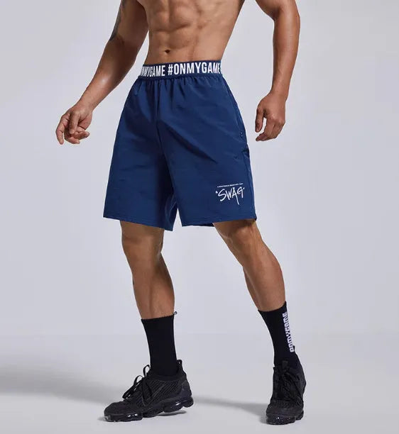 Men's loose fit sports shorts in breathable fabric with elastic fly opening