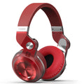 Black Bluetooth headset with head-mounted design, showcasing bilateral earpieces for stereo music playback.