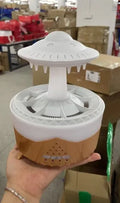 UFO-shaped cloud humidifier with rain drop sound and 7-colour night light