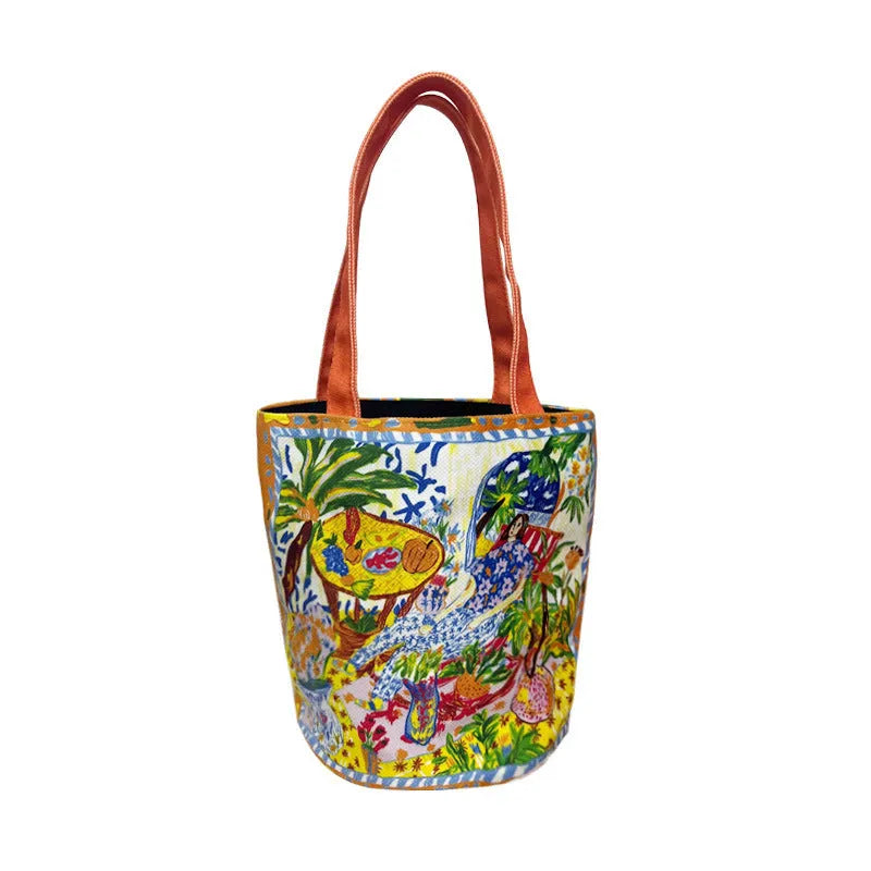 Dream Garden orange plush bucket bag with printed design, canvas lining, and double shoulder straps
