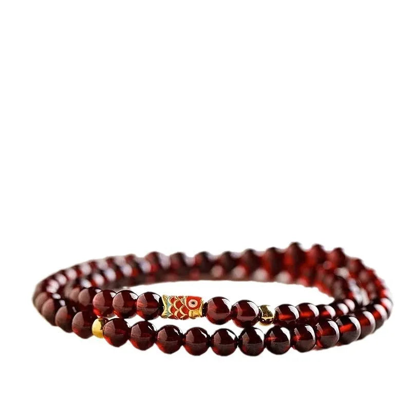 Wine red glass bead garnet bracelet with new Chinese style design showing single circle configuration